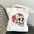 Close-up of canvas tote bag featuring floral sugar skull and red roses design - Sugar Skull Heart