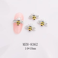 Macro shot of 3D bee nail art charm with yellow enamel and pearl on pink gradient background - Silver Base Bee With Pearl Style (8362)