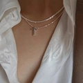 Silver double layer necklace with pearl beads and a cross pendant for a stylish look - Silver Double Layer Bead Chain Cross Necklace (5727201HB)