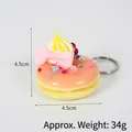 Porte-clés donut rose et jaune avec nœud et strass, diamètre de 4,5 cm - Décoration beignet perle artificielle (avec porte-clés) / 4.50cm / Corail