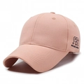 Dusty rose cotton baseball cap with embroidered side logo and curved brim - Adjustable / Soft Pink