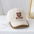 Detail of baby baseball cap featuring a cute 3D bear patch and KIMI embroidery texture - 50cm (1-3 Years) / KIMI Bear-Off White