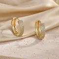Detail of 18K gold hoop earrings with triple row pave-set cubic zirconia stones - B6-01 Three Row Pave Round Zircon Huggie