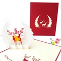 3D pop-up Christmas card with red reindeer and tree cutout design - Snowflake Deer