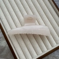 Elegant jelly-colored matte shark clip in soft powdery beige on a jewelry display tray - 11.5cm Horn Style / Jelly White