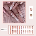 Close-up of pink glitter coffin press-on nails with 3D floral accents and rhinestones - BKS1937 Glitter Gradient Camellia