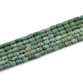 Macro detail of turquoise barrel-shaped agate beads showing natural geode textures - Barrel Beads 6x8mm/23pcs / Grass Green