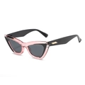 Cat eye sunglasses featuring transparent pink and black two-tone frames with gold metal accents - Black Pink Frame Black Gray Lens