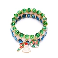 Dreiteiliges Weihnachts-Armbandset mit grünen Perlen und festlichen Anhängern aus Metall - 3er-Set Blau Grün Hautfarben Baum Zuckerstange Kranz