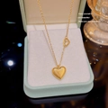 Elegant gold heart pendant necklace featuring a dainty chain in a soft green jewelry gift box - X132 Simple Heart Style