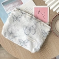 White plush makeup bag featuring grey butterfly patterns and fun fun party label - Lace Butterfly Storage Bag - Light Green