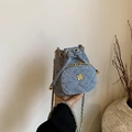 Mini blue denim camellia bucket bag with gold chain strap and drawstring closure - Denim Blue