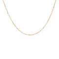 Detail of minimalist gold chain necklace featuring delicate small pink round beads - Necklace / Pink