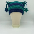 Blue and green striped crochet cat ear beanie with hanging star charms and tassels - Blue Green Striped