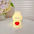 Cute yellow rabbit night light with red heart and soft glowing vinyl finish - Heart Rabbit