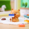 Funny Capybara resin car ornament holding a humorous blue sign for desk decoration - You Do It Bear (1188-35)