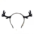 Close-up of black deer horn headband with velvet material and decorative lace trim - Antler