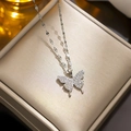 Silver bowknot pendant necklace with sparkling cubic zirconia on a wavy chain - Silver Butterfly Necklace With Full Zircon (8961)
