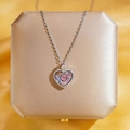 Collier à pendentif cœur rose avec nacre irisante et chaîne en O argentée - Collier Cœur Argenté en Nacre Colorée