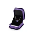 Octagonal velvet jewelry box in purple with a blue four-leaf clover pendant necklace - Small Pendant Box / Purple With Black Interior