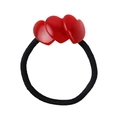 Detail view of elastic hair tie with three vibrant red heart-shaped acetate charms - Red (Style B)