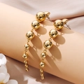 Eleganti orecchini pendenti dorati con sfere a cascata su supporto minimalista - Stile a Perla Lunga Dorata (sku6658)