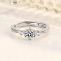 Polished silver adjustable engagement ring with six-prong moissanite setting for couples - Female Style
