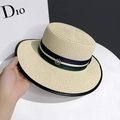 Beige boater straw hat with striped ribbon and metallic M logo in a side-view shot - Beige / Adjustable