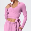 Detail of pink tie-front yoga top featuring wrap-around straps and soft brushed fabric - S / Tops / Rose Pink