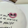 Pink heart-shaped hollow hair clip with black metal base on white ceramic plate - Pink Heart