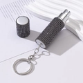 Detail of portable perfume spray bottle with black rhinestones and silver keychain - 5ml / Gray