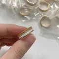 Luxury four-layer gold multi-texture ring featuring white ceramic and diamond accents - Gold White Ceramic Wide Version