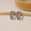 Macro shot of silver hoop earrings featuring pavé cubic zirconia and geometric cutouts - Full Zirconia Hollow Geometric Pattern Earrings-Silver