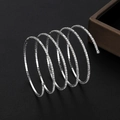 Elegant multi-layer spiral bridal bracelet with sparkling rhinestones on leather background - 5 Rows / Silver