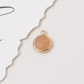 10mm peach orange faceted round crystal birthstone pendant with golden metal frame - Faux Jade Orange