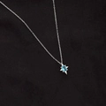 Élégant collier en argent S925 avec pendentif étoile et une pierre de topaze bleue ovale - Argent 925 / Argent (NS741)