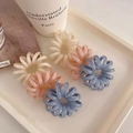 Detailed view of glossy jelly-colored spiral hair ties in beige, pink and blue - Girly Pink & Blue (6Pcs)