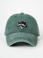 Detail view of embroidered raccoon pattern on vintage washed dark green baseball cap - 56-58cm (Adjustable) / Dark Green