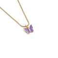 Detail of gold box chain necklace with purple butterfly pendant and small zircon stones - Purple