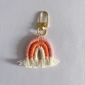 Handmade woven cotton rainbow keychain in pink and orange shades with a gold clasp - Lotus Pink