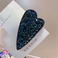 Detailed close-up of dark blue heart-shaped rhinestone hair clip on jewelry card - Dark Blue