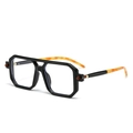 Black geometric frame sunglasses with stylish tortoiseshell temples and metal accents - Bright Black Frame Black Orange Temple Clear Lens