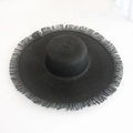 Women's black wide-brimmed woven straw beach hat featuring frayed fringe edges for summer - One Size / Raw Edge Style / 48cm Fringe Black