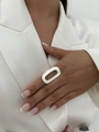 Minimalist brushed silver hollow oval alloy ring shown on model in white silk suit - Silver Long Hollow