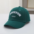 Detailed close-up of white Houston U.S.A embroidery on a dark green canvas baseball cap - 50-54cm(3-8 Years) / Dark Green