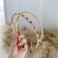 Baroque gold headband featuring clear crystals and pearls in a wide hollow design - Rhinestone Yellow