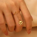 Chic gold heart open ring featuring a dangling paw print charm on a delicate chain - Cat Paw Style (N-721)