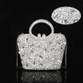 Close-up of sparkling rhinestone evening bag with luxury crystal bow and metal handles - 15x14 Navette Handheld Silver