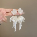 Detail of elegant cream floral tassel earrings with beaded fringe held in hand - 41# Silver Earring Post - White - Flower
