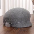 Detailed view of gray wool cloche hat featuring mink fur ball and rhinestone accents - M (56-58cm) / Gray